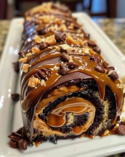 Gooey Chocolate Caramel Turtle Cake Roll